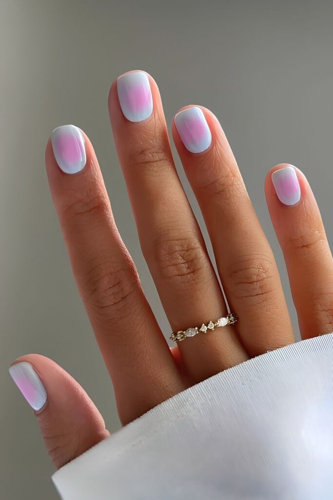 Baby blue mani with pink aura blend