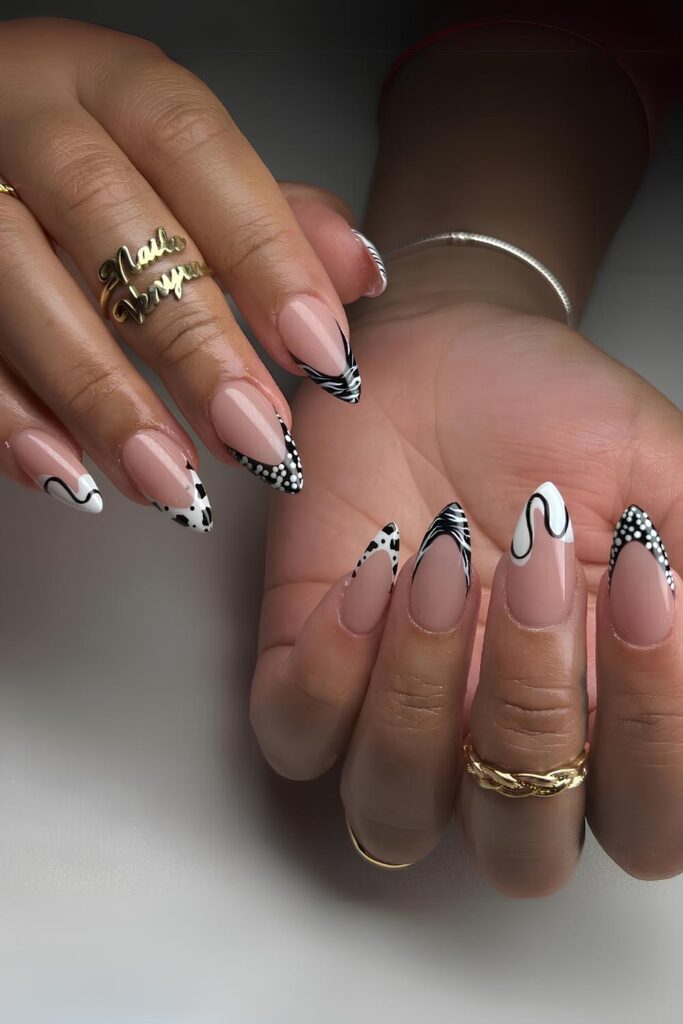 Black and white French nails with different patterns