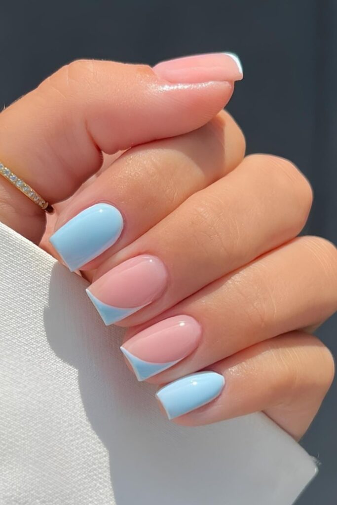 Light blue nails with side tip accents