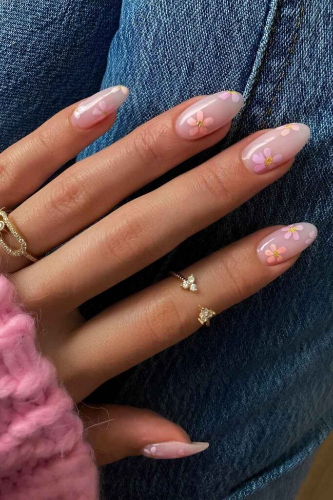Milky pink almond nails with peach and pink florals