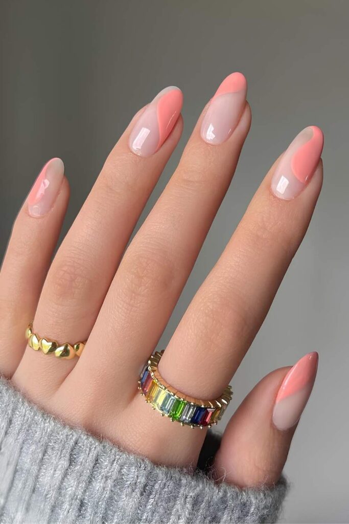 Natural almond nails with peachy swirls and negative space