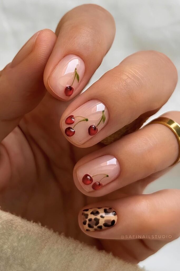 Natural short mani with cherries and leopard print