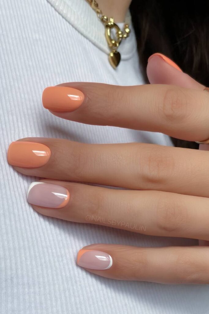 Peachy nails with white reversed tips