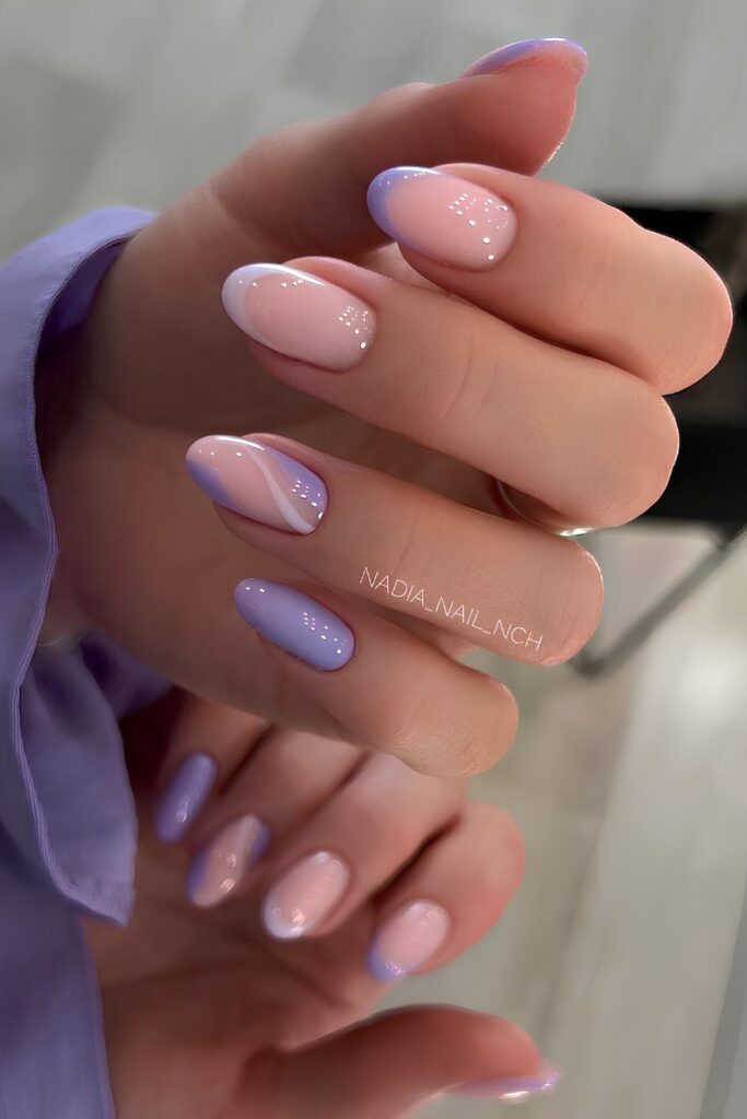 Purple nails with swirls