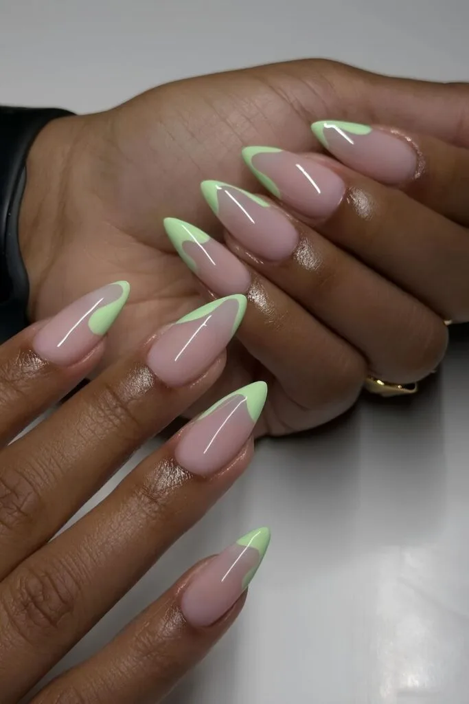 Sheer almond nails with mint abstract tips