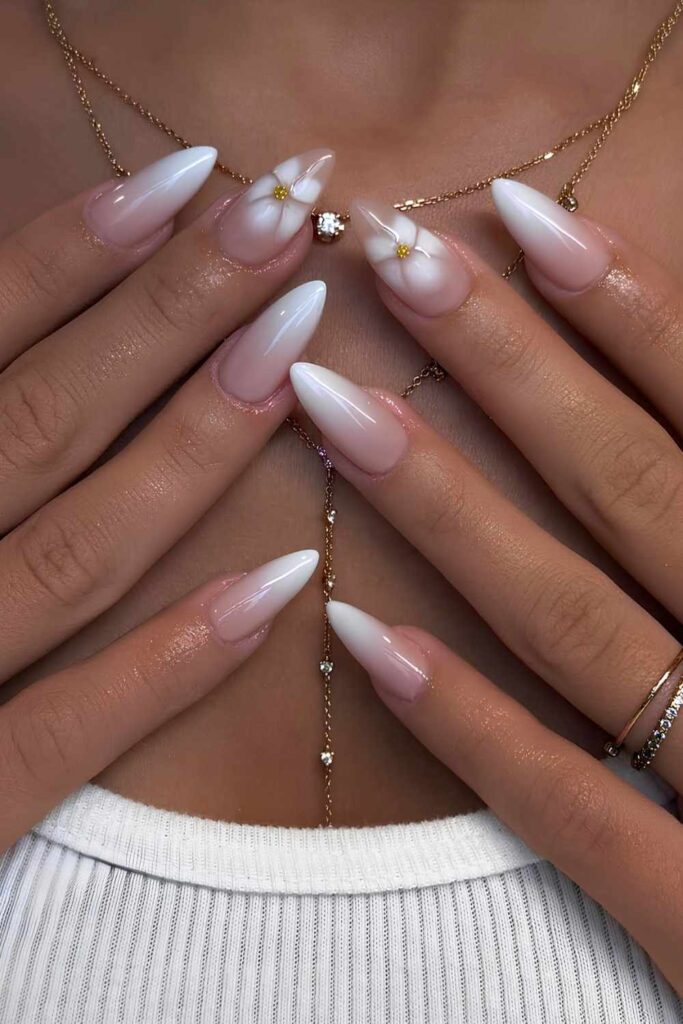 White ombre nails with blooming floral art