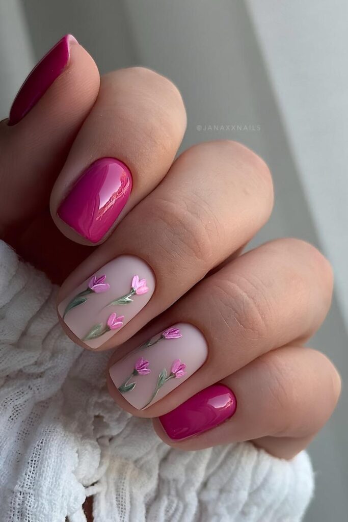Hot pink nails with floral accents