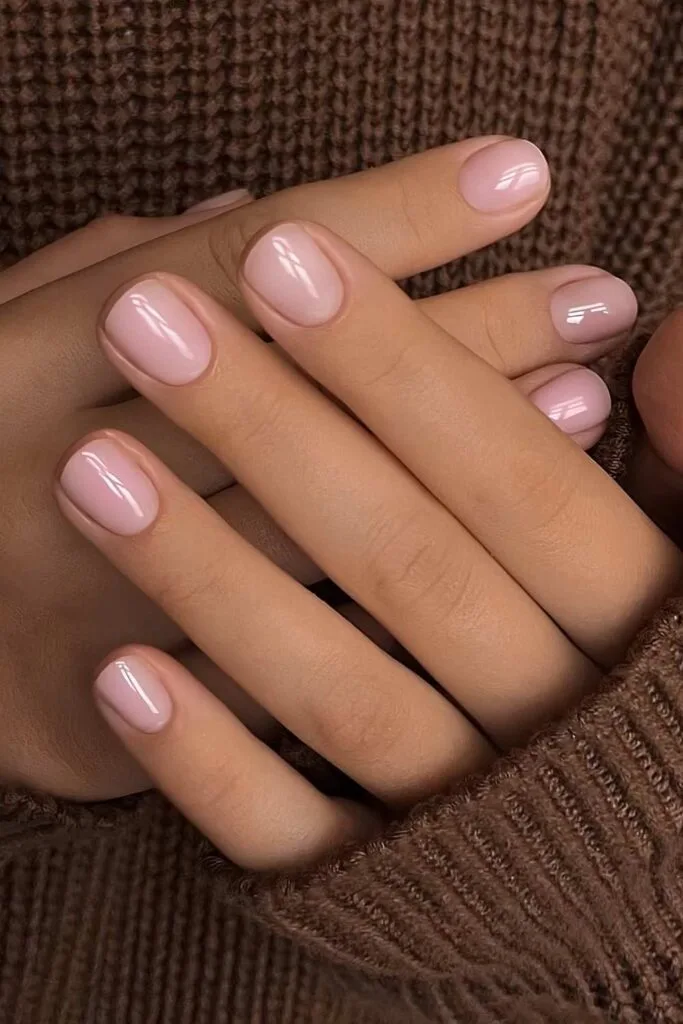 Light pink nails with lip gloss effect