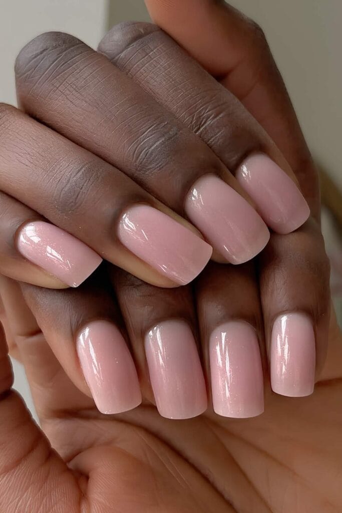 Light pink nails with subtle sparkles