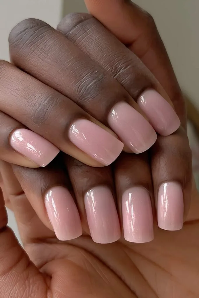Light pink nails with subtle sparkles