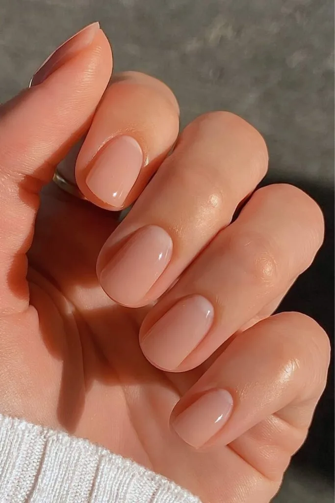 Neutral short nails with half moon details