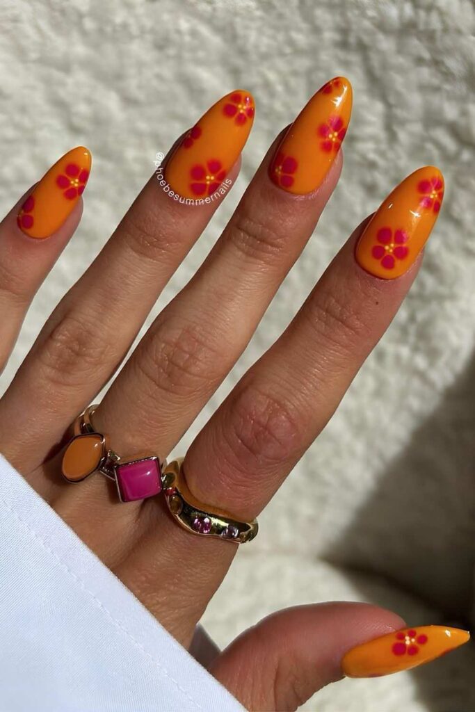 Orange mani with pink blooming florals