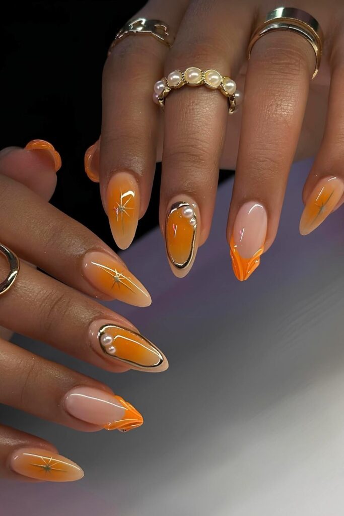 Orange nails with mixed designes