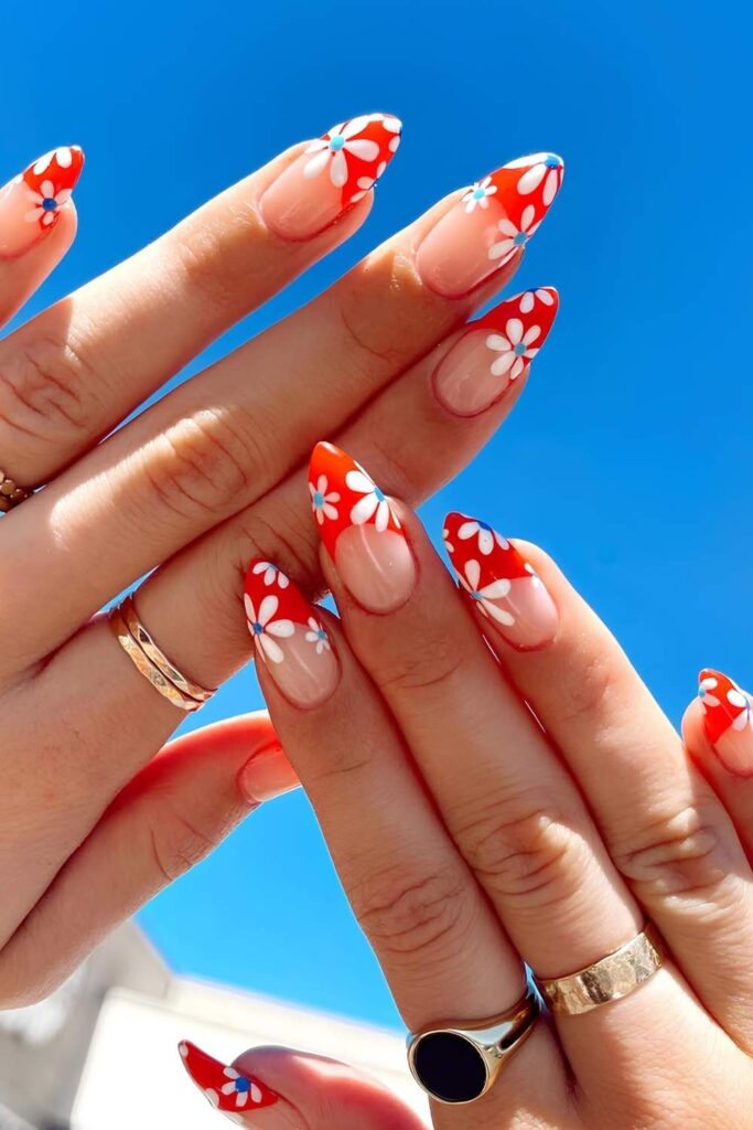 Red French nails with white and blue florals