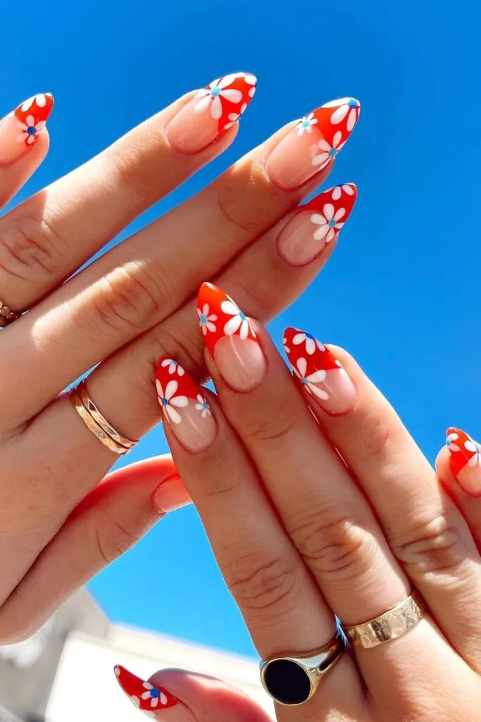 Red French nails with white and blue florals