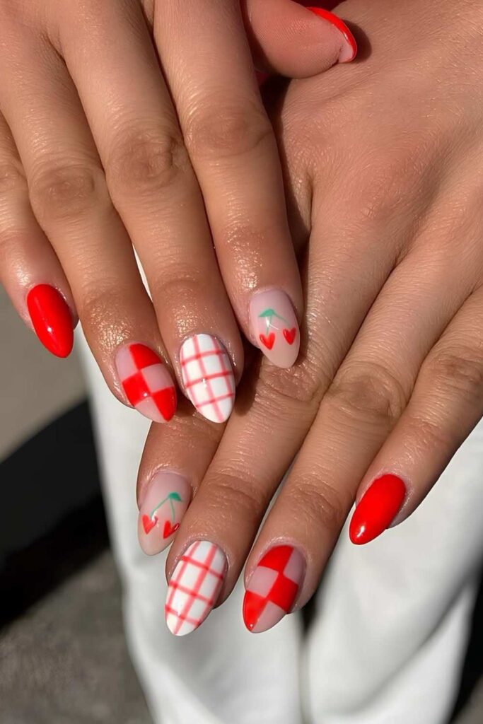 Red nails with cherries, checkerboard and line art
