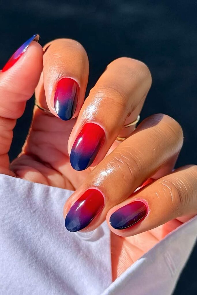 Red to dark blue ombre nails