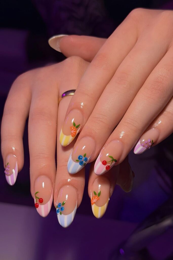 Striped French nails with fruit accents
