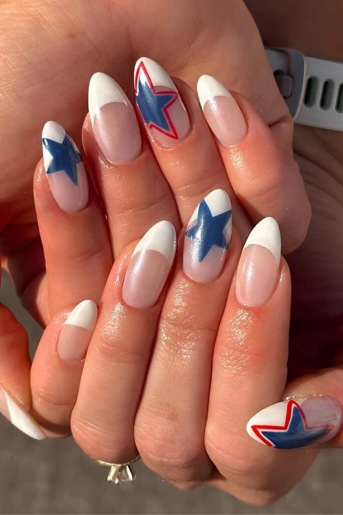 White French nails with blue stars and red star frame