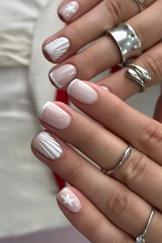 White nails with stars and line art
