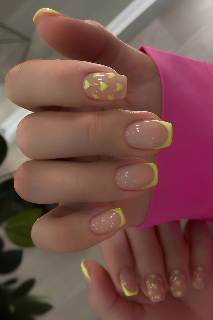 Yellow French nails with hearts