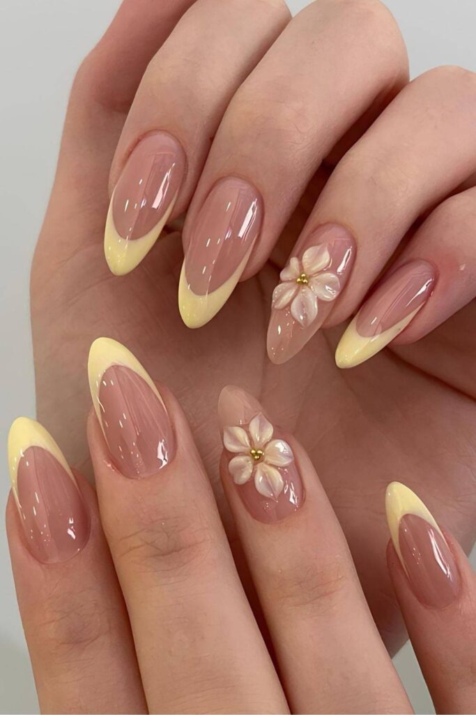 Butter yellow French nails with 3d flowers
