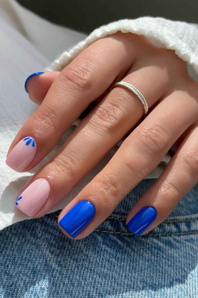 Cobalt blue and light pink nails with petals