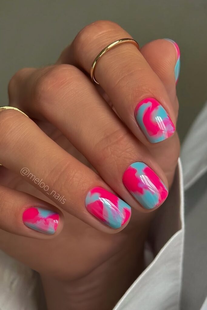 Hot pink and blue marble mani