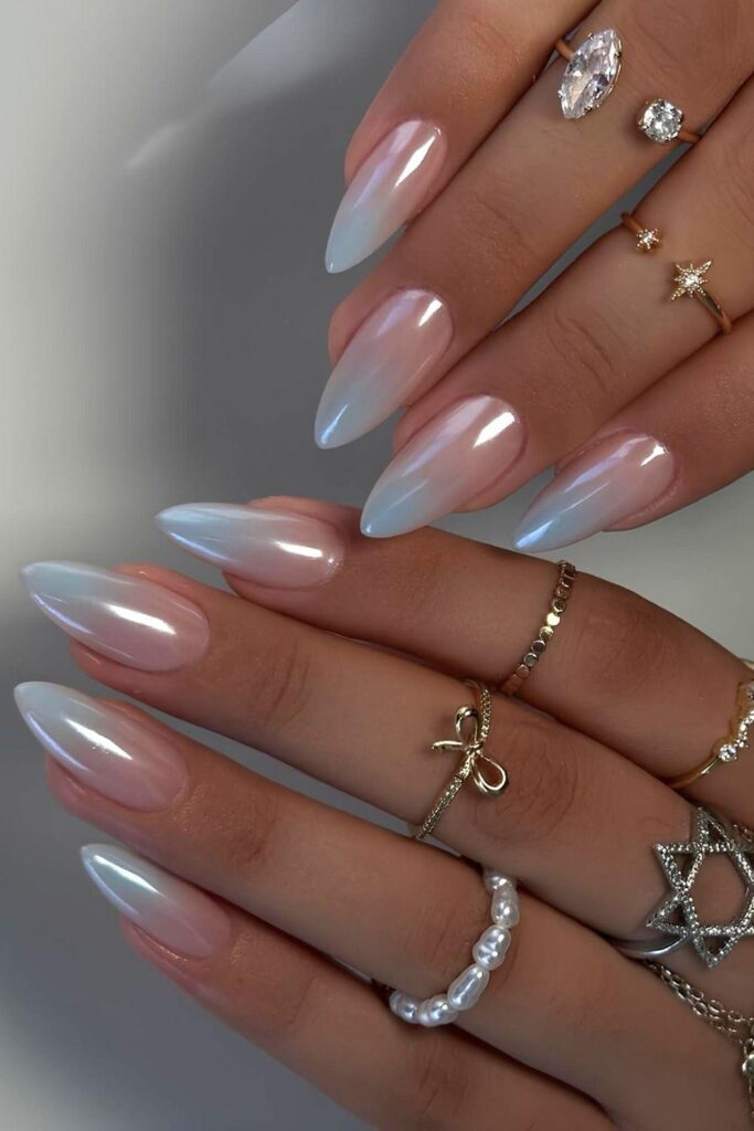 Light blue ombre nails with chrome finish
