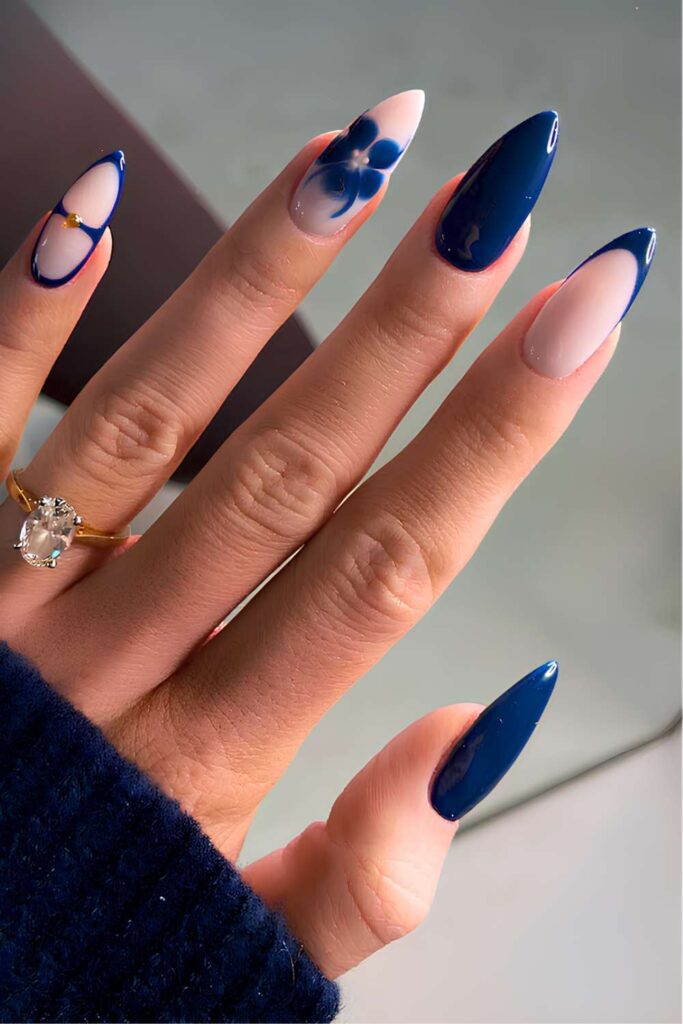 Navy blue nails with blooming flower