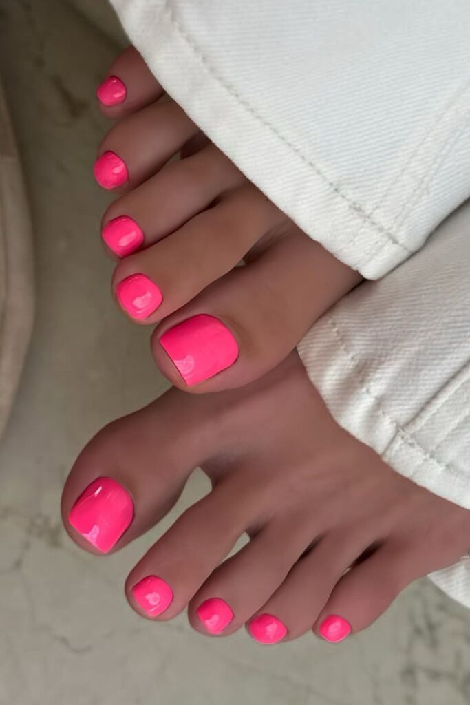 Neon pink pedicure