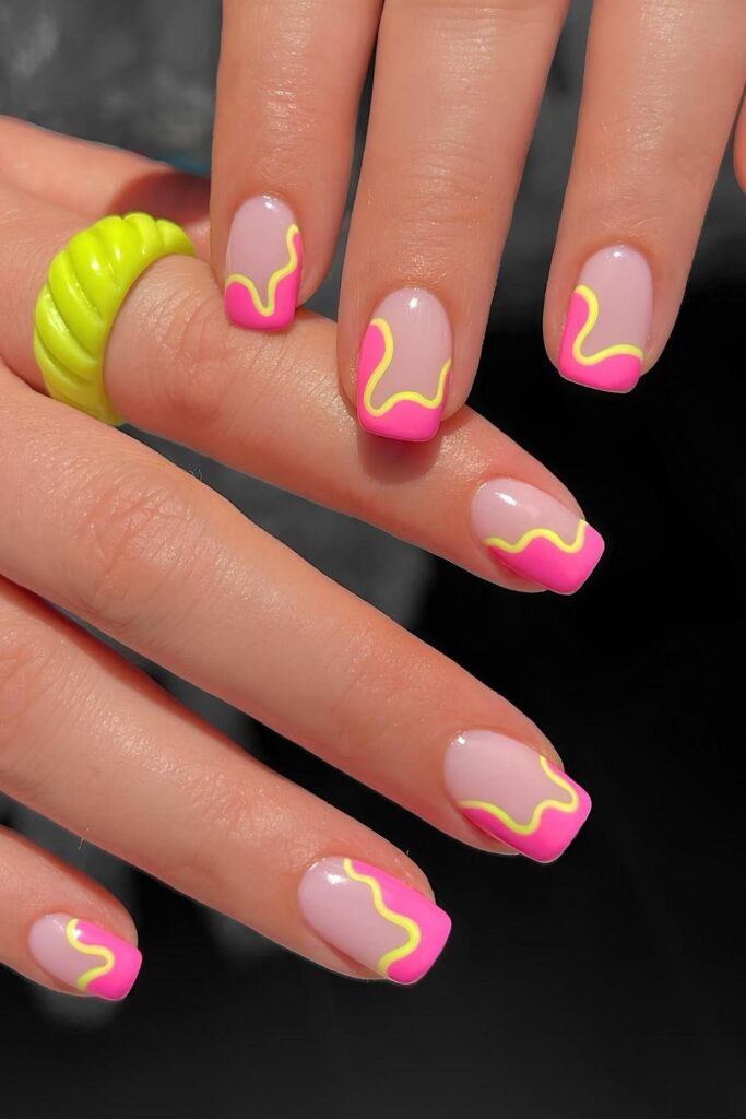 Pink and yellow abstract nails