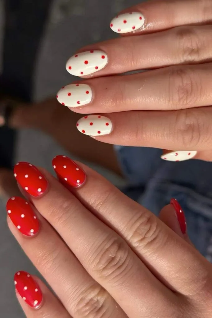 Red and white polka dot nails