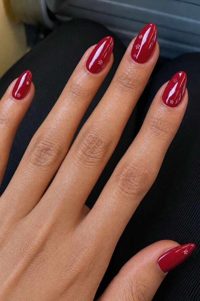 Red chrome nails with florals