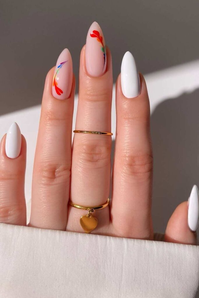 White mani with colorful feathers