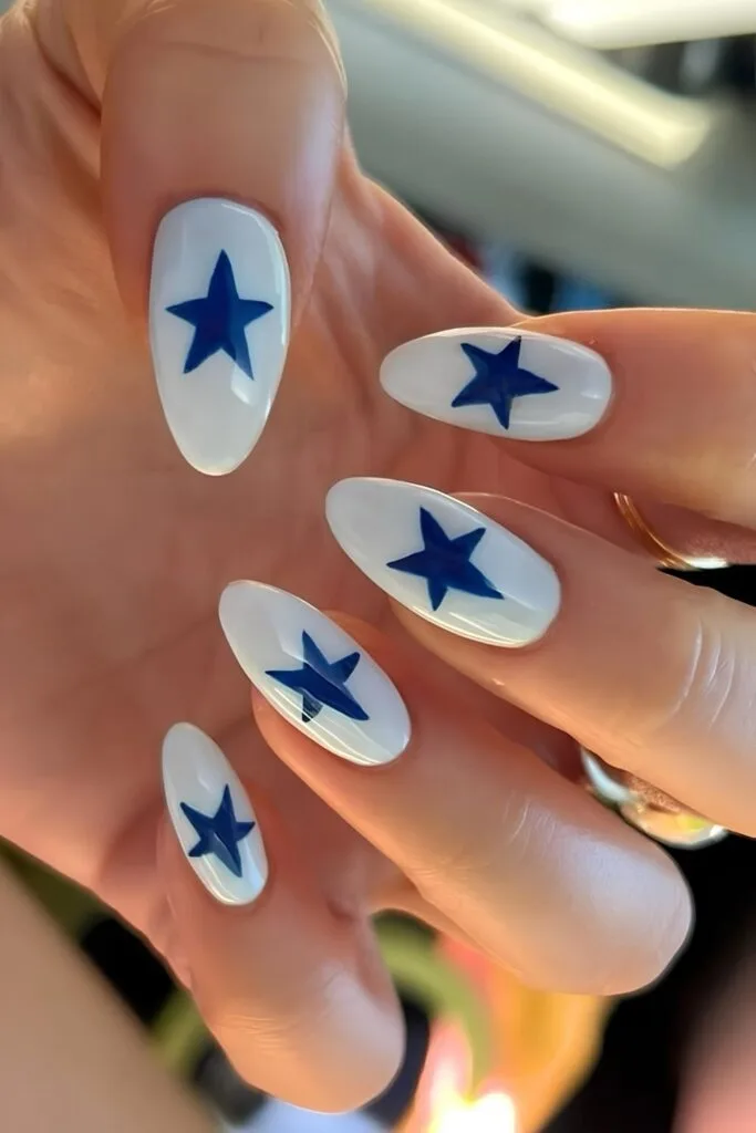 White nails with blue stars