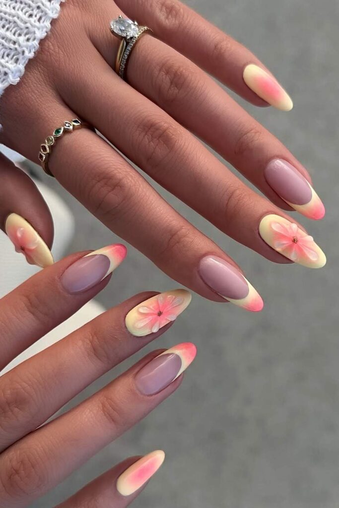 Yellow and orange nails with 3d floral