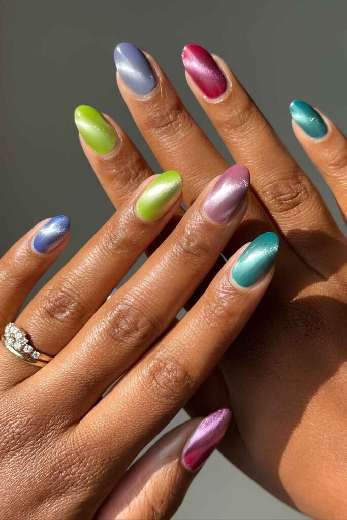 Colorful velvet nails in jewel tones