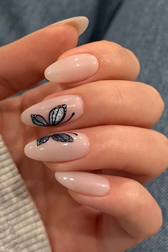 Milky nails with gray and black velvet butterfly