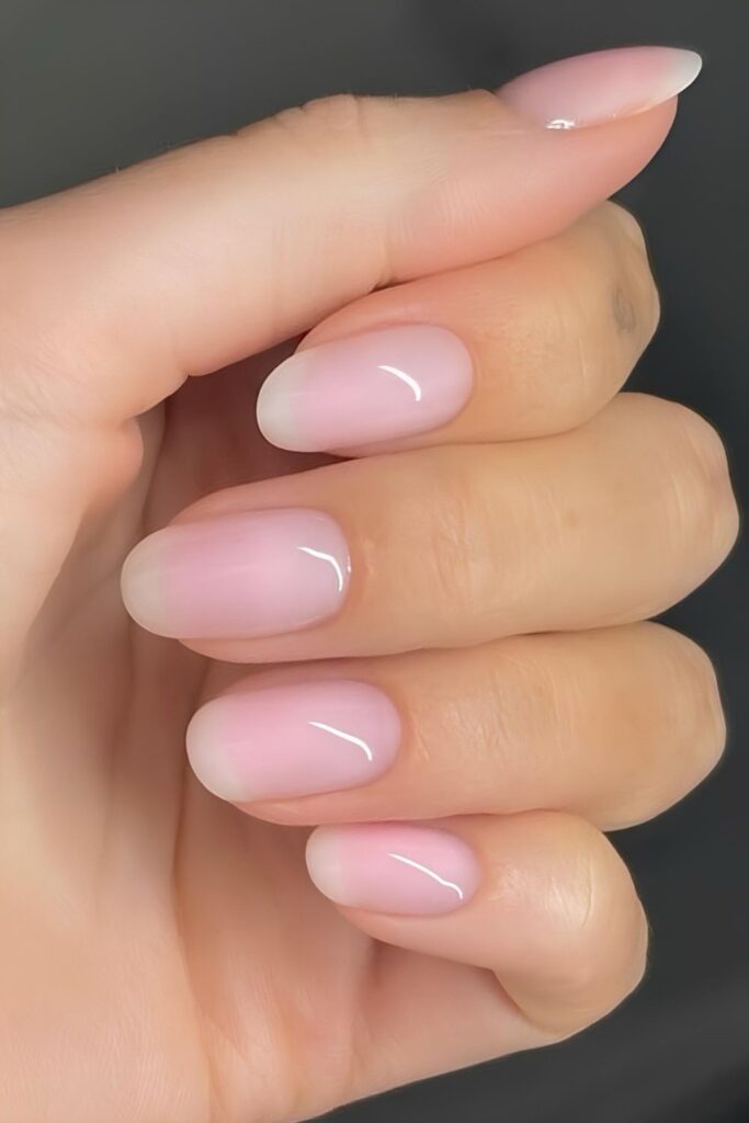 Milky pink French nails with smooth ombre fade