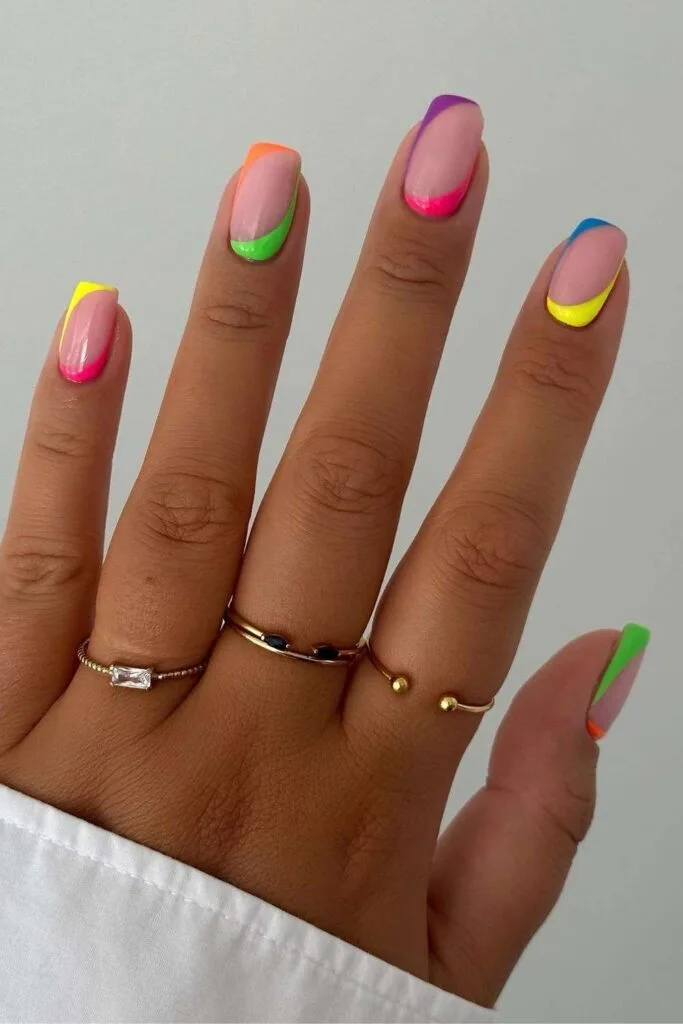 Neon colorful reversed French nails