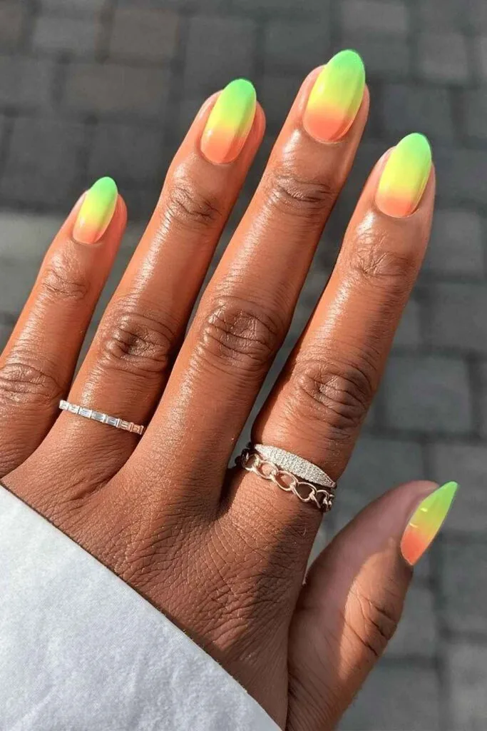 Neon gradient nails in orange, yellow and green
