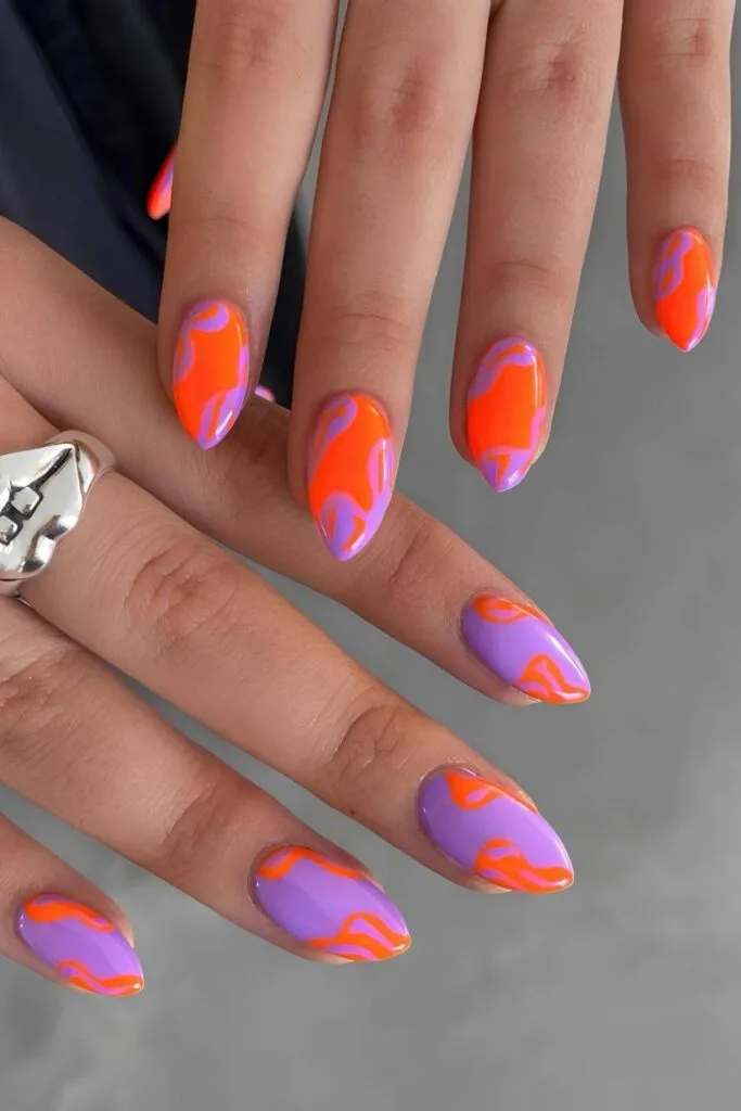 Neon purple and orange abstract nails