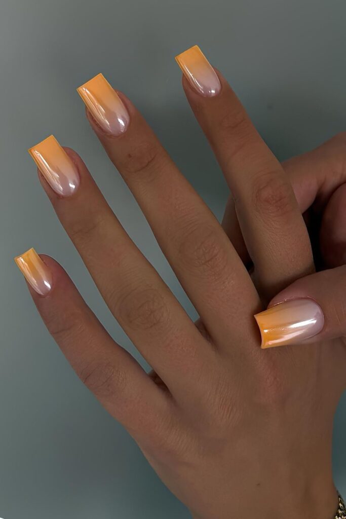 Orange French nails with ombre fade