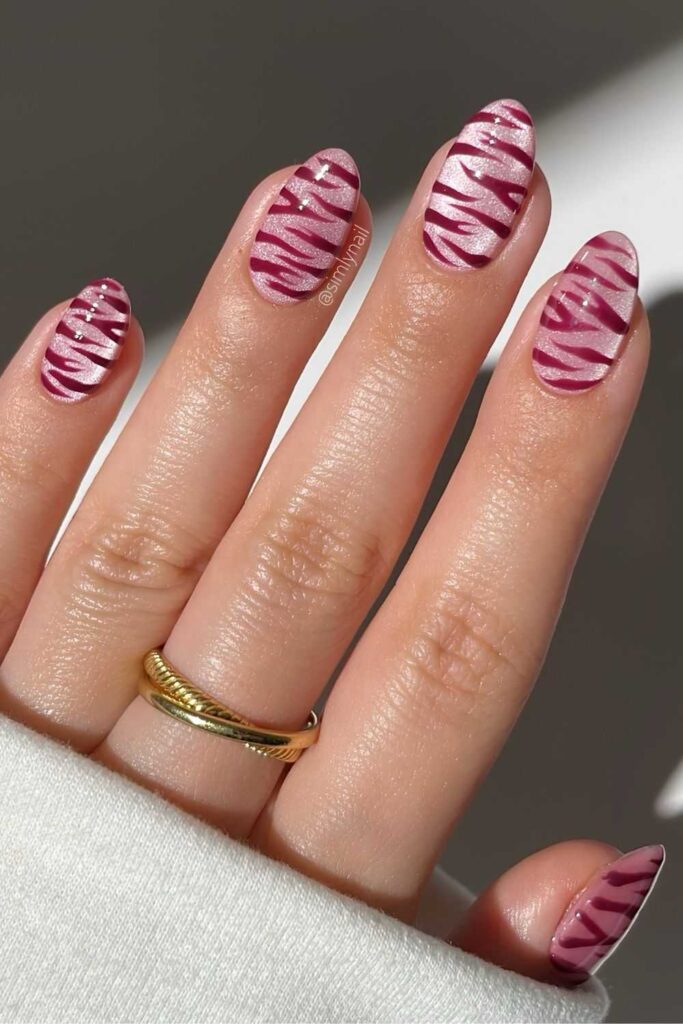 Pink and red zebra velvet nails