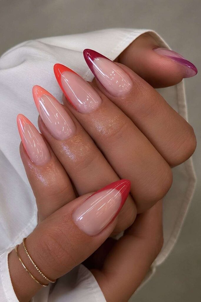 Pointed French nails in pink, red and purple