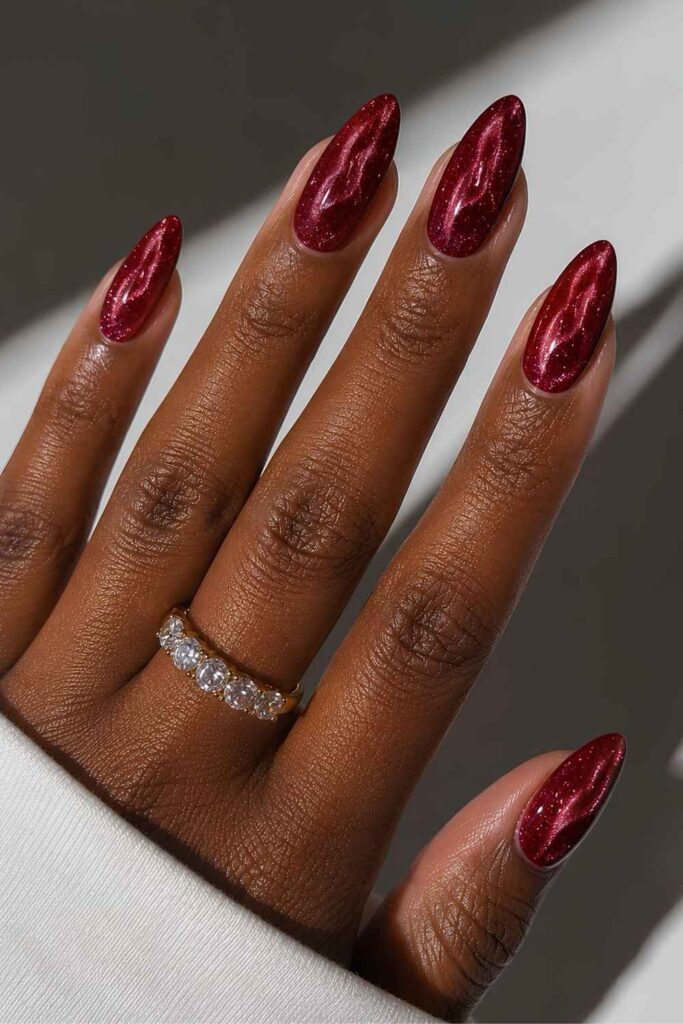 Red velvet nails with swirly design