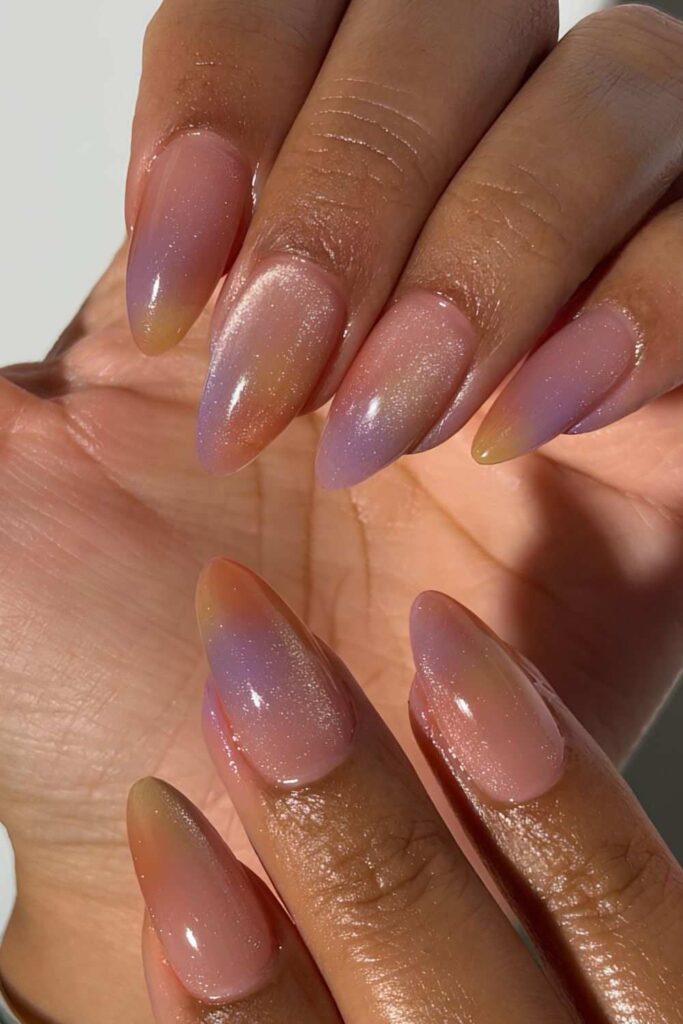 Sunset-inspired gradient nails with velvet effect