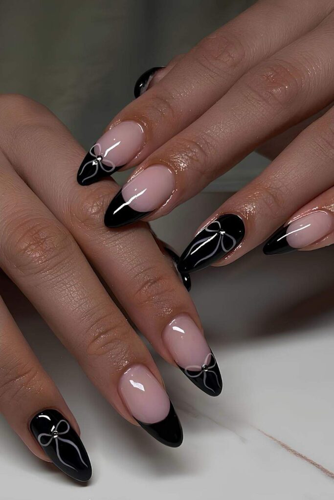 Black French and solid nails with light pink bows