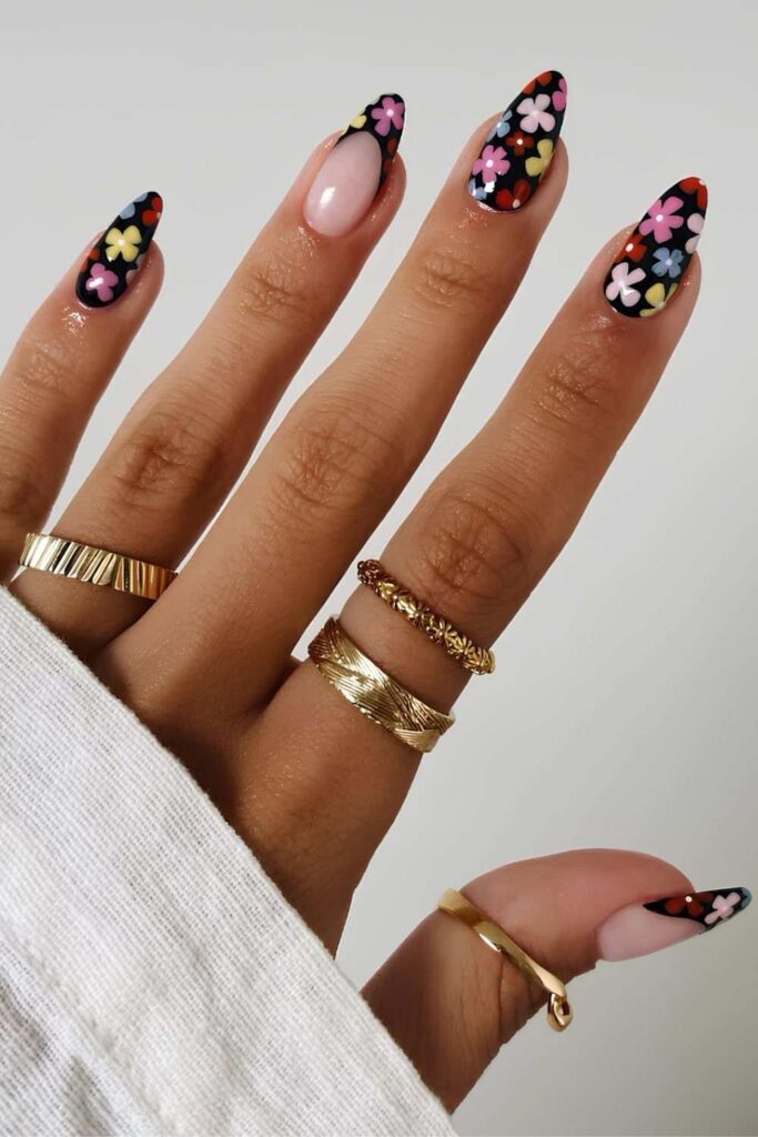 Black nails with colorful flowers